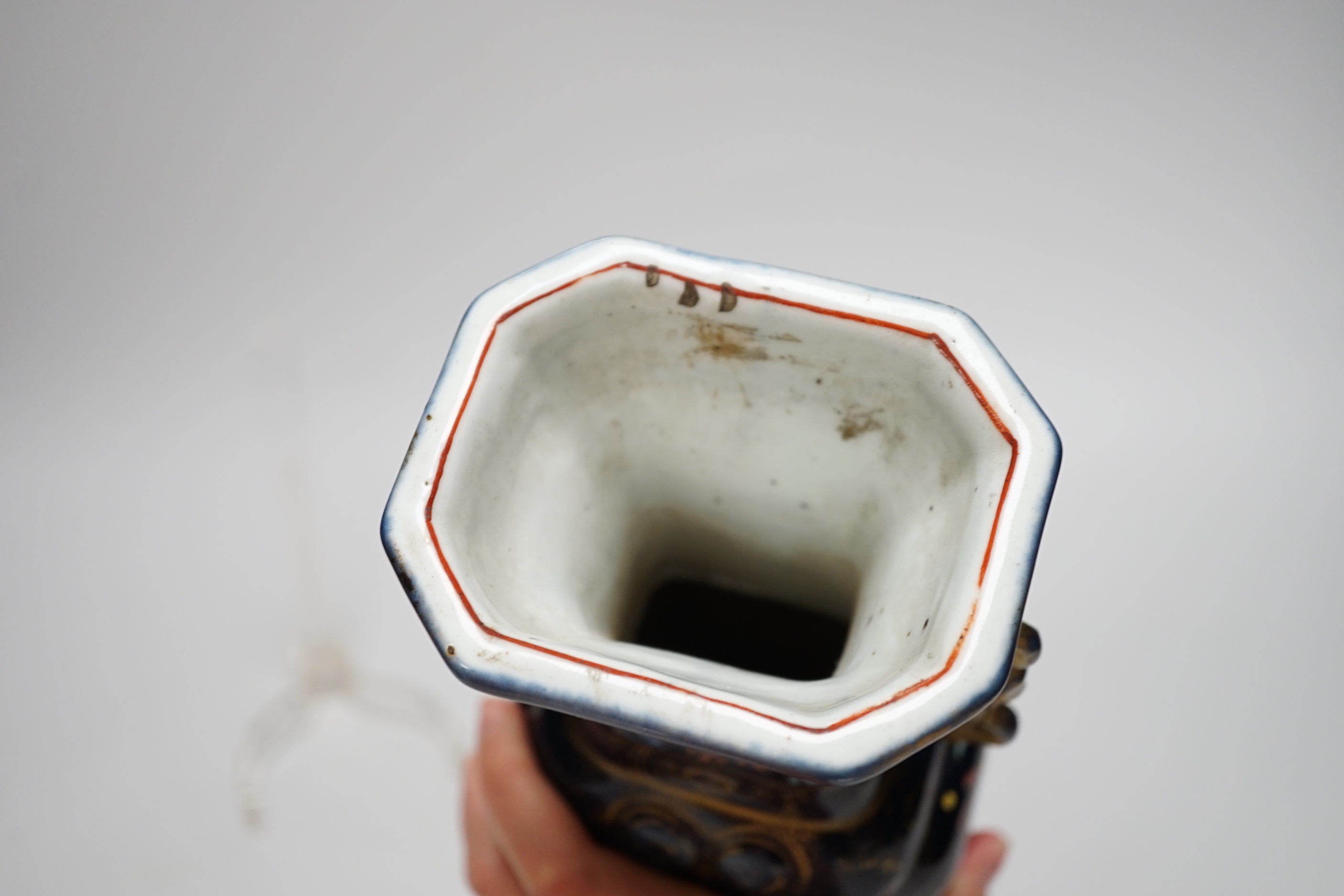 An 18th century Chinese export blue and white charger, a similar soup bowl and a late 19th century enamelled blue ground vase, 32cm